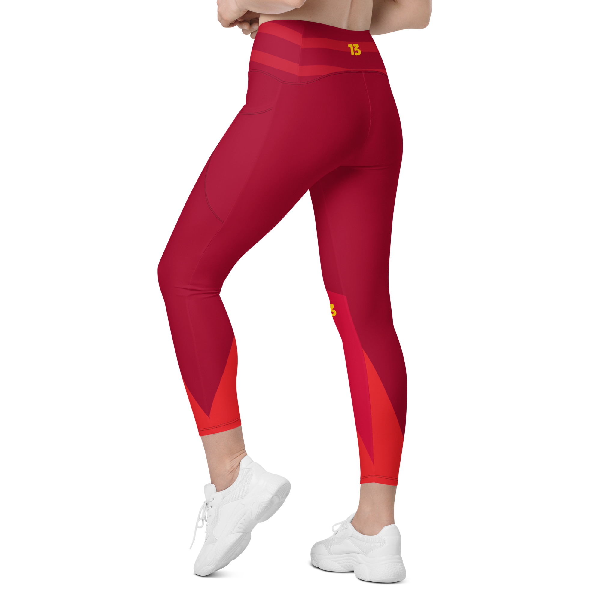 Left side back profile of Crimson Ride leggings highlighting the integrated utility pocket and signature '13' hallmark branding.