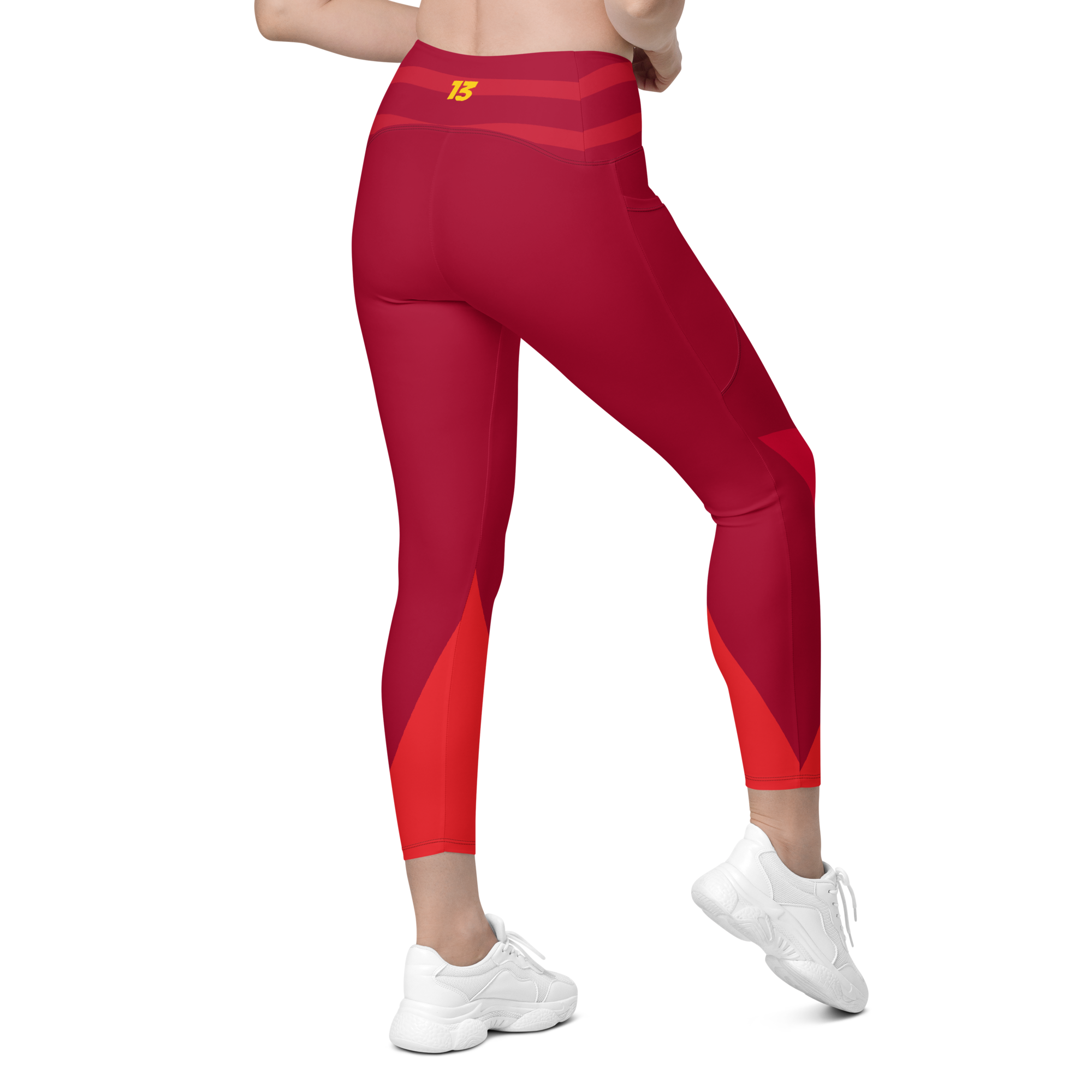 Right side back view of Crimson Ride high-performance leggings showcasing the streamlined athletic silhouette and functional side pocket.