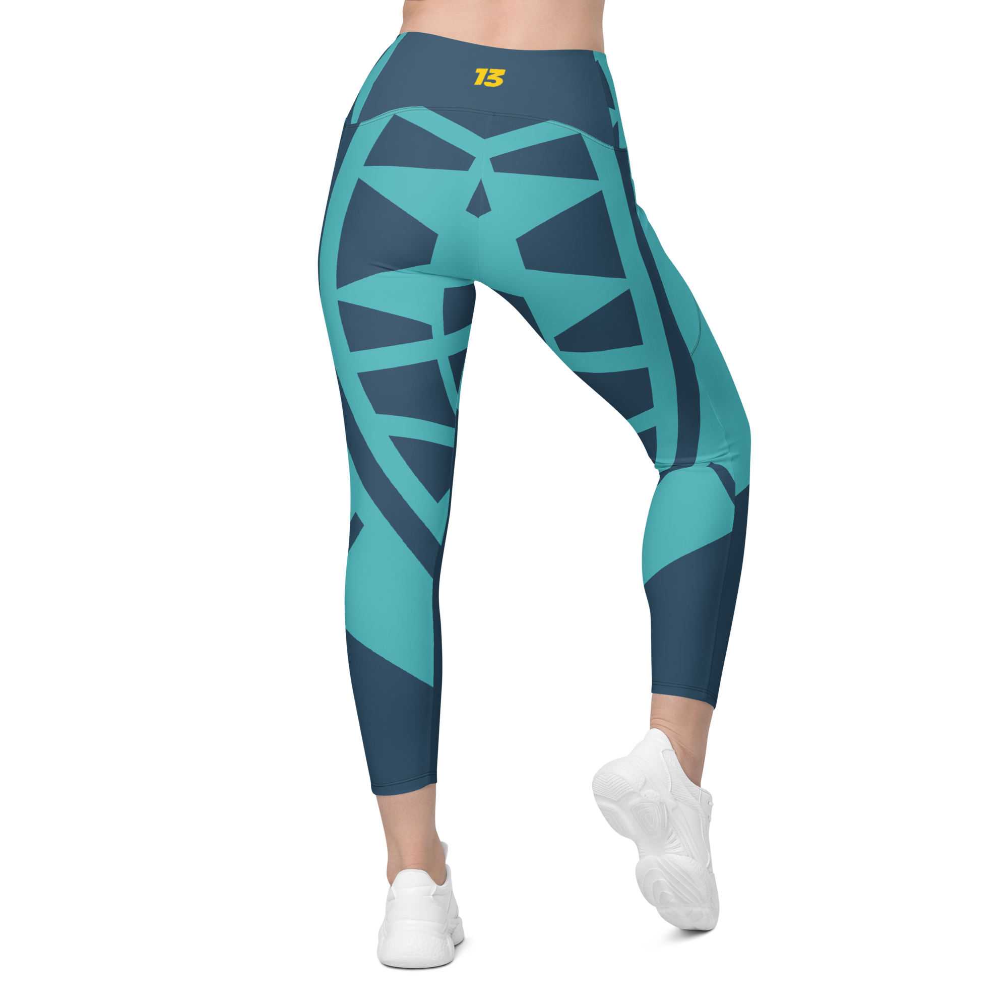 Persistent 13 Electric Reef Pocket Leggings - Full back view highlighting the reinforced elastic waistband, artisan coverstitch seaming, and the seamless "silk-touch" finish.