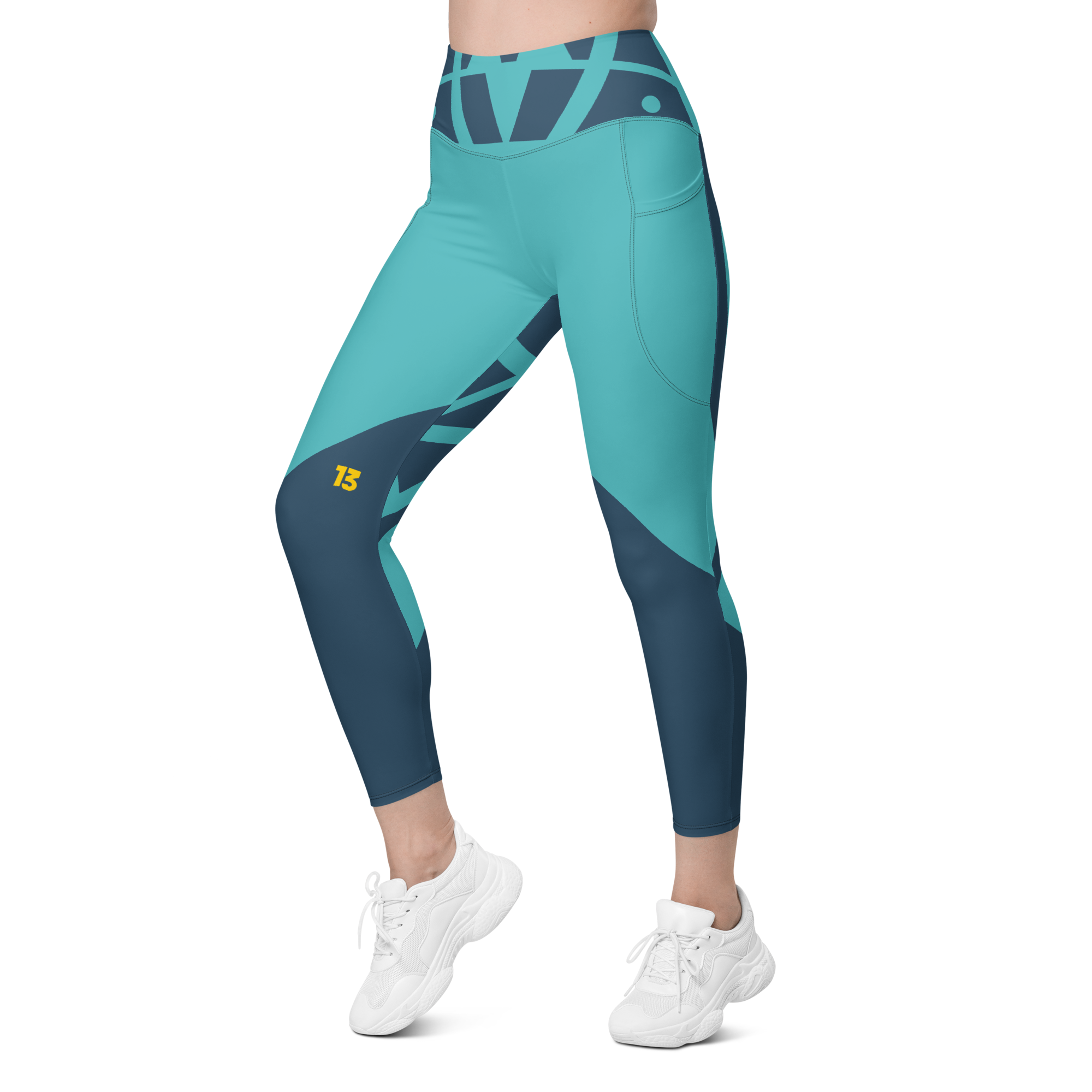 Left front angle of Electric Reef Leggings featuring artisan construction and high-performance recycled eco-blend fabric.
