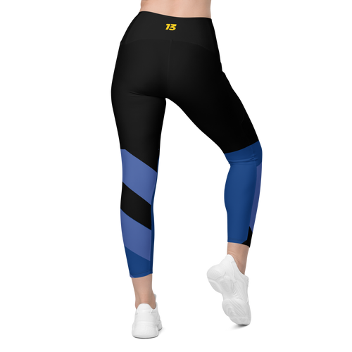 Back side profile of Fragmented Blue leggings highlighting the integrated utility pocket and signature '13' hallmark branding.