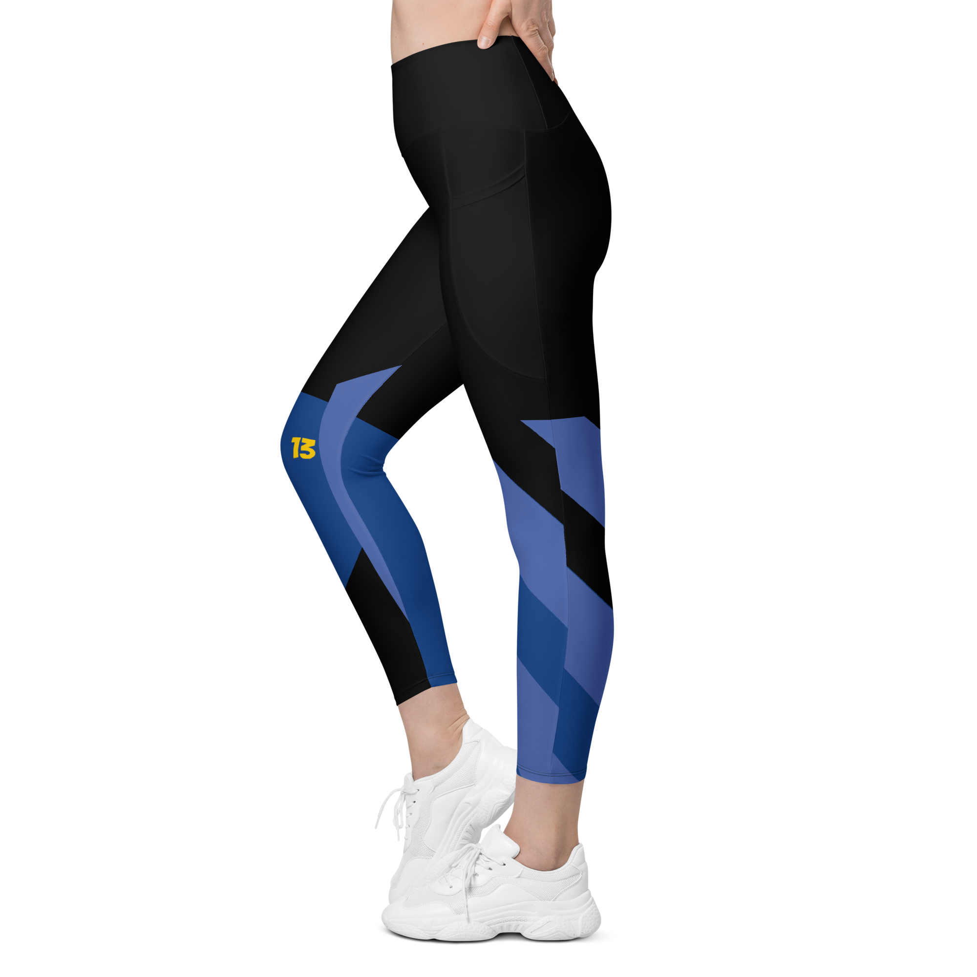 Left side profile of Fragmented Blue leggings highlighting the integrated utility pocket and signature '13' hallmark branding.