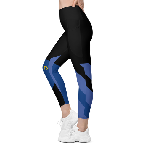 Left side profile of Fragmented Blue leggings highlighting the integrated utility pocket and signature '13' hallmark branding.