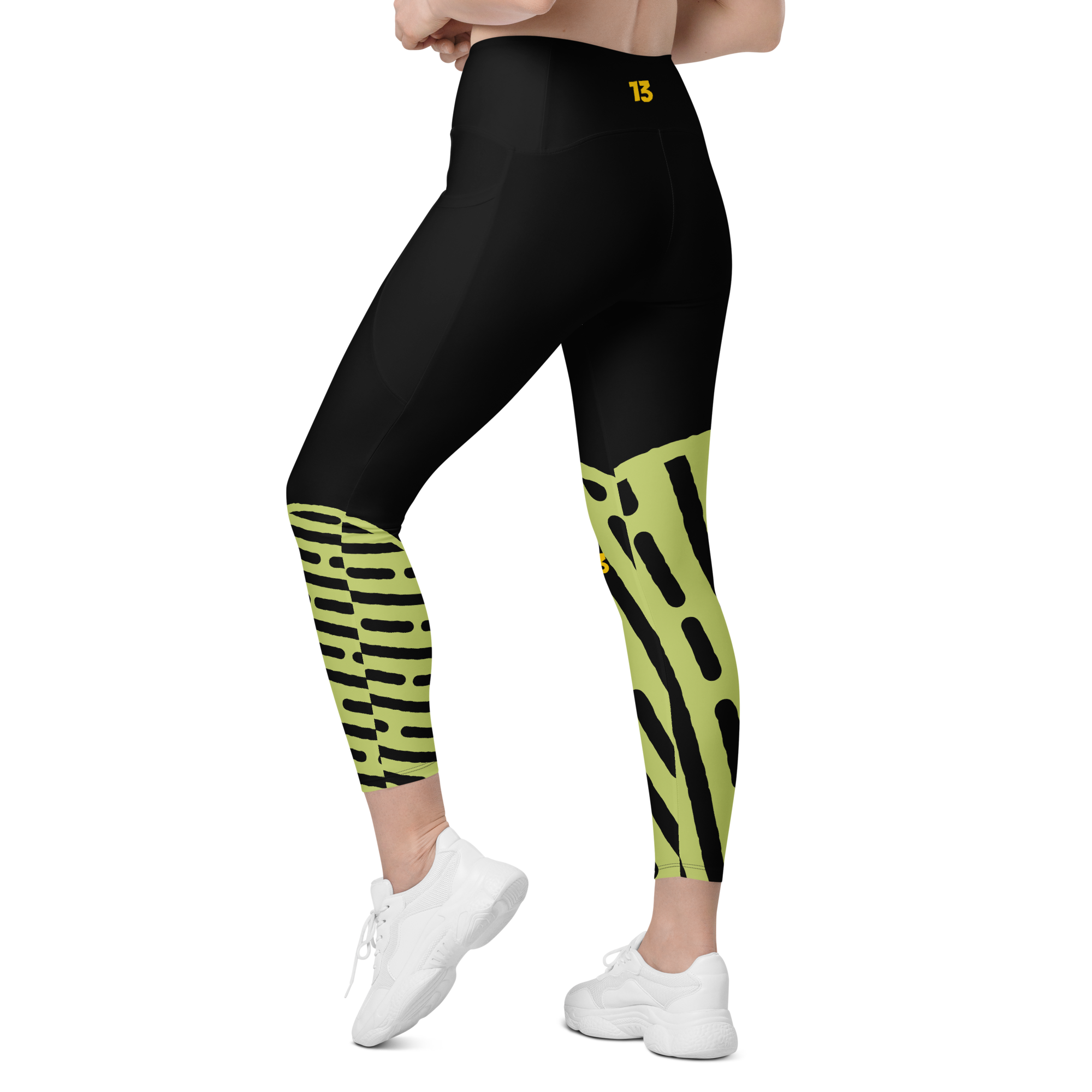Left side back profile of Neon Walk leggings highlighting the integrated utility pocket and signature '13' hallmark branding.