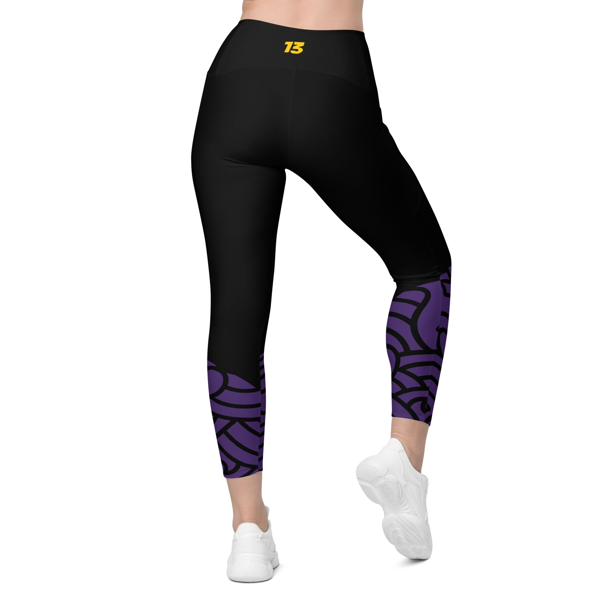 Full back view of Violet Vortex leggings displaying the reinforced high-rise waistband and premium seaming.