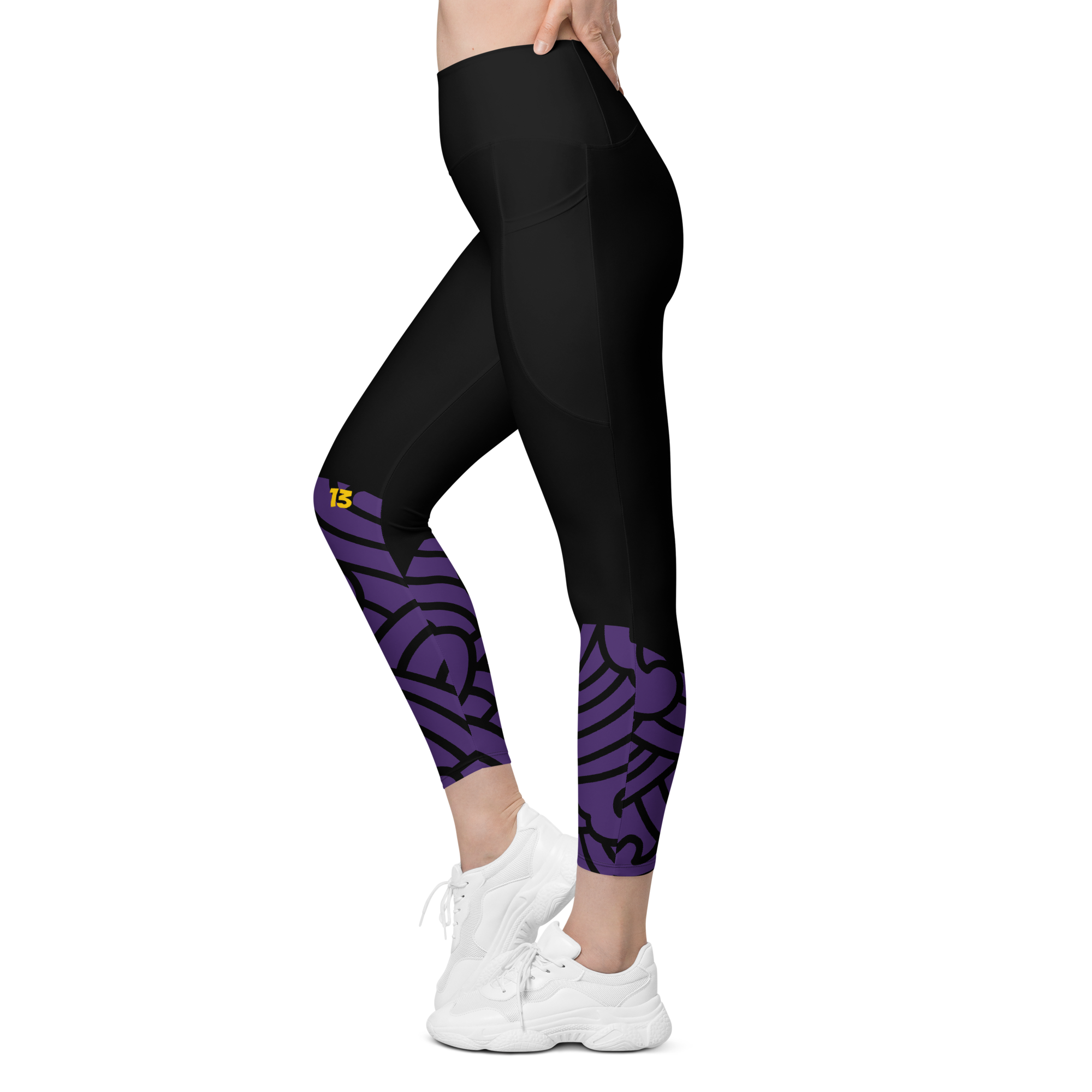 Left side profile of Violet Vortex leggings highlighting the integrated utility pocket and signature '13' hallmark