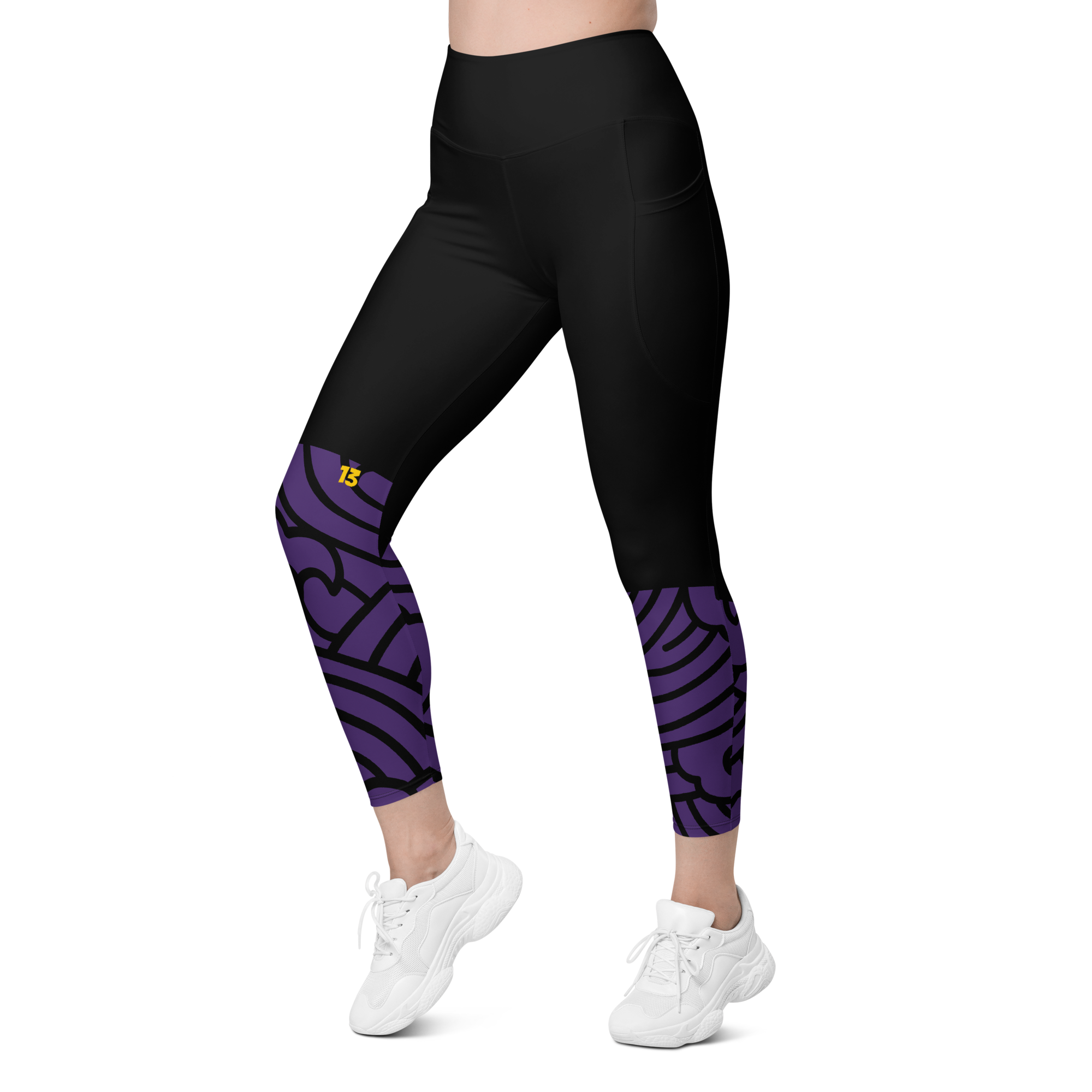 Left side profile of Violet Vortex leggings highlighting the integrated utility pocket and signature '13' hallmark.